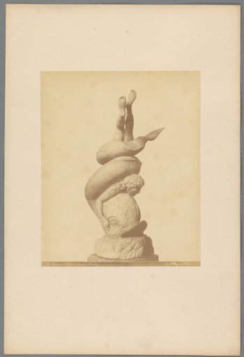 Sculpture of Amor and a dolphin in the Neapolitan Museums, Italy