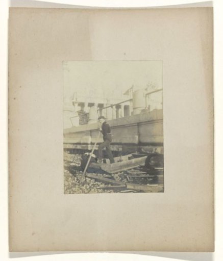 Tony Artz as a boatman on a small boat (driftwood) at the World's Fair in St. Louis (Louisiana Purchase Exposition), 1904