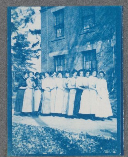 Group of female students on the street, possibly on the campus of Denison University in Ohio