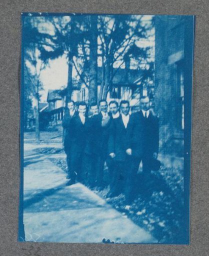 Group of students on the street, possibly on the campus of Denison University in Ohio
