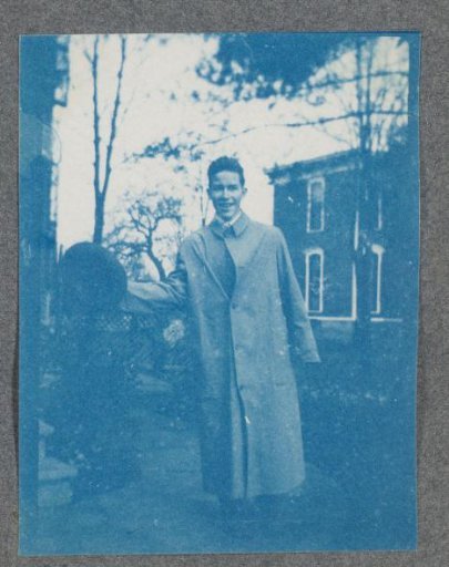 Student on the street, possibly on the campus of Denison University in Ohio