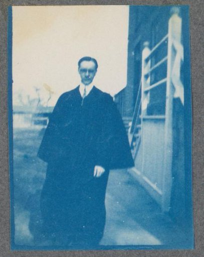 Student on the street, possibly on the campus of Denison University in Ohio