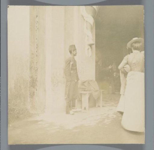 Military guard watching the entrance to a building (or a pavilion at the Exposition Universelle (World's Fair), Paris, France)