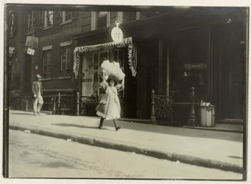 Carrying home-work thro Greenwich Village