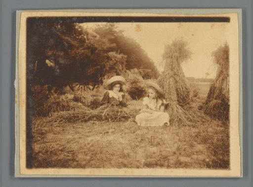 Johanna (Hans) de Jong and Johanna (Nan) Vreede near haystacks in a meadow
