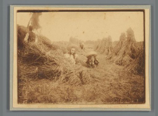 Johanna (Hans) de Jong and Johanna (Nan) Vreede near haystacks in a meadow