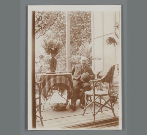 Willem de Jong sitting on the veranda of the house of Piet de Jong in Arnhem