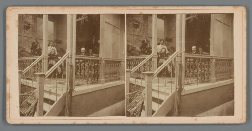 Lambertus de Jong, Hendrina (Dina) de Jong-Ploeg, Johanna de Jong-Voet and Piet de Jong on the veranda of Piet de Jong's house in Arnhem