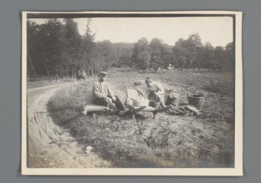 Man and Woman Working in a Wooded Landscape