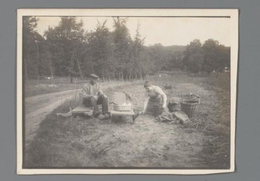 Man and Woman Working in a Wooded Landscape