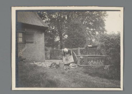Woman Working on the Land by a Farm