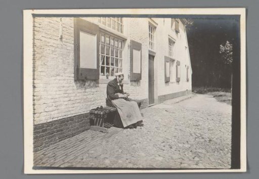 Knitting Woman in Front of a Farm