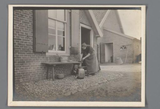 Woman Working by a Farm