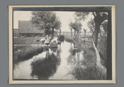 Woman with Young Child by a Ditch Behind a Farm