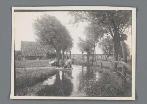 Woman by a Ditch Behind a Farm