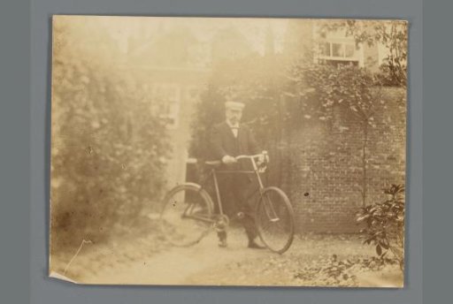 Portrait of Willem de Jong with a Bicycle in Hand