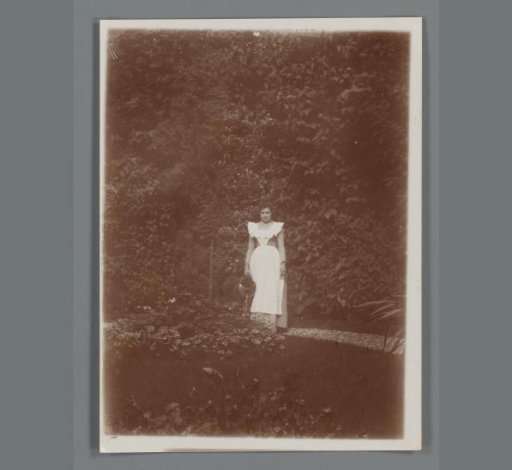 Portrait of an Unknown Woman with a Watering Can in a Garden in Leiden