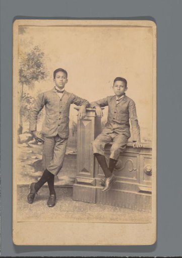Studio portrait of Frédéric Gabriël Dumas (standing) and his brother Tonnie