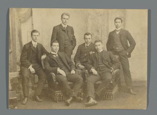 Group portrait of Frédéric Dumas and his circle of Indian Delft students, in the photography studio