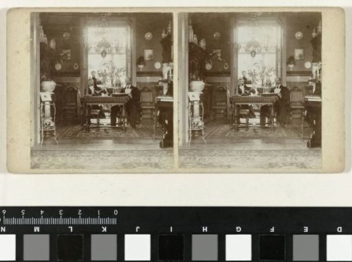 Interior of the De Schamphelaere family (Ghent, Belgium) with four people and a stereoscope