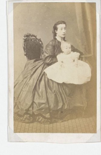 Portrait of a woman with a baby on her lap
