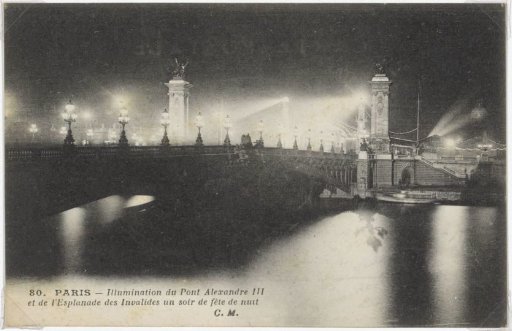 Illuminated Pont Alexandre-III and the Esplanade des Invalides in Paris by night