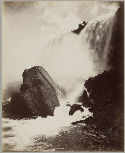 View of Niagara Falls with a rock in the foreground