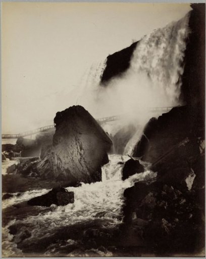 View of Niagara Falls with a rock in the foreground