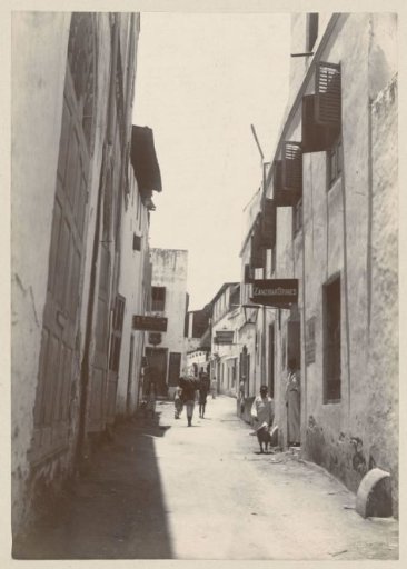 Passers-by in a street in Zanzibar