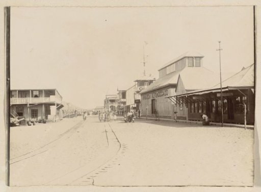 Rua Conselheiro Ennes in Beira Mozambique with railway line and companies