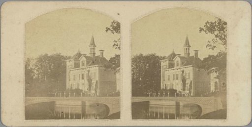 Country house with a tower near a bridge