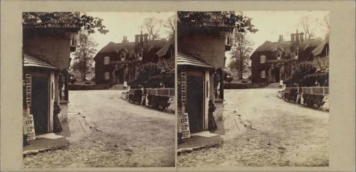 Street in Shanklin with a hotel and a kiosk with newspapers and (presumably) photographs