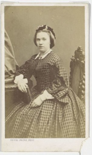 Portrait of a woman in a checkered dress