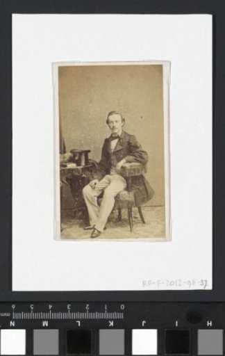 Portrait of a man with a coat and a tall hat
