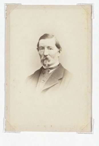 Portrait of a man with a mustache and sideburns