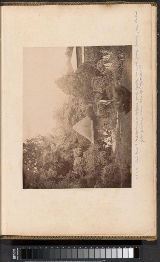 Members of the Crommelin family seated in a garden