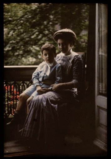 Woman with a child on her lap