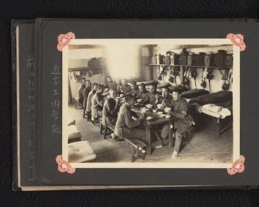 Japanese soldiers during a meal in a barrack