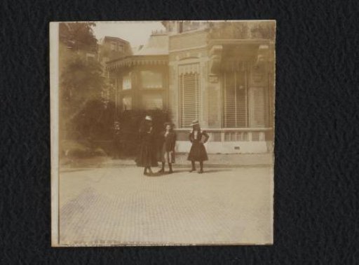 Three Girls, Including Probably An and Go Kessler, Before a Dwelling House