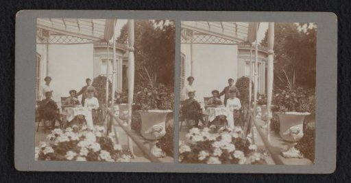 Five people, including Dolph, Go and Guus Kessler, on a veranda