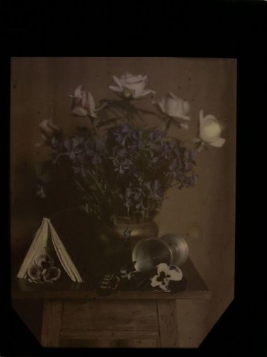 Vase with roses and violets
