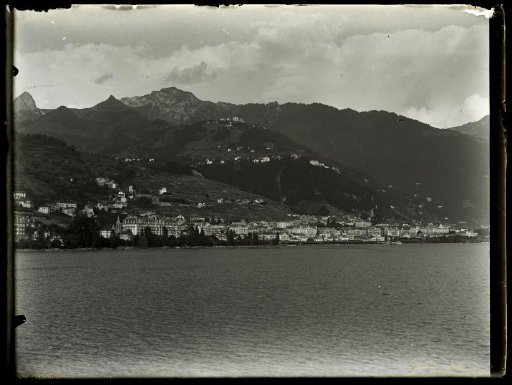 Mountain landscape with a town on the coast