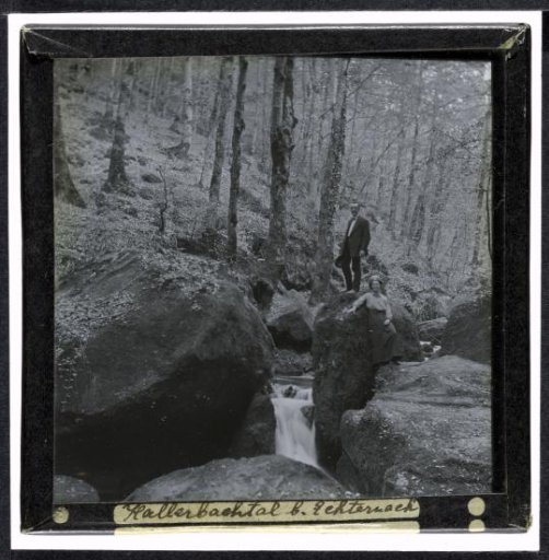 Man and Woman by Rocks and a River in a Forest near Echternach