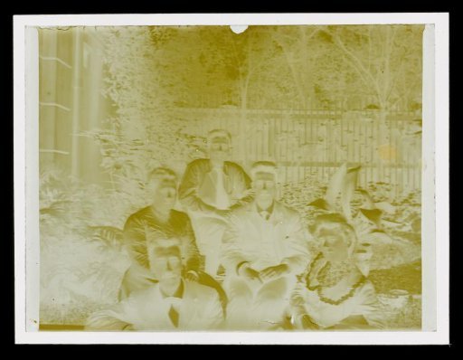 Group Portrait of Five Unknown People in a Garden