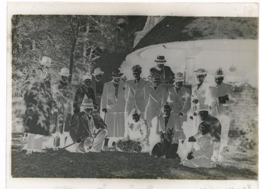 Group Portrait with Sixteen Unknown People in a Garden