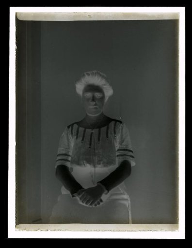 Portrait of an Unknown Woman Sitting in a Chair