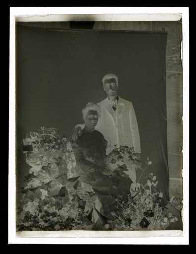 Portrait of an Unknown Woman and Man with Flower Bouquets