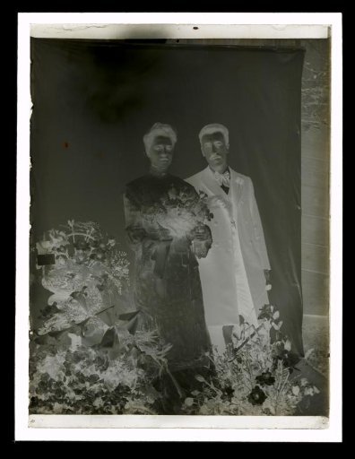 Portrait of an Unknown Woman and Man with Flower Bouquets