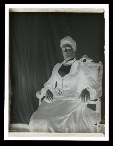 Portrait of an Unknown Woman Sitting in a Chair