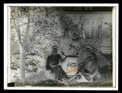 Group Portrait with Five Unknown People in a Garden